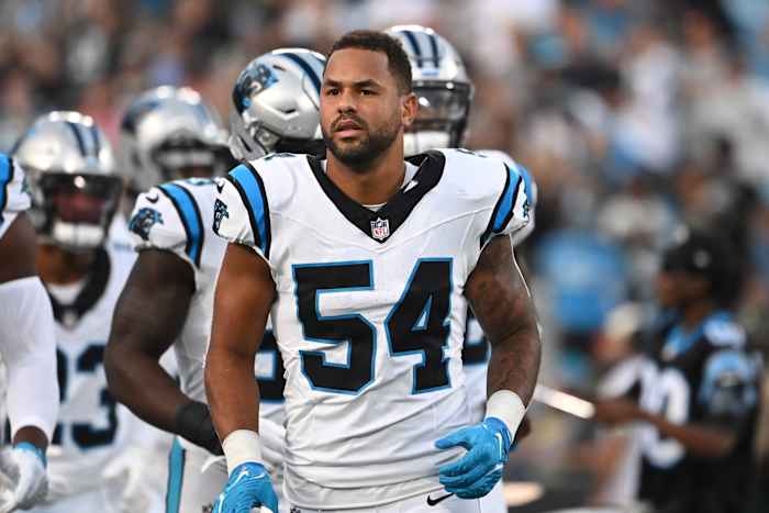 Sep 18, 2023; Charlotte, North Carolina, USA; Carolina Panthers linebacker Kamu Grugier-Hill (54) runs on to the field before the game at Bank of America Stadium.